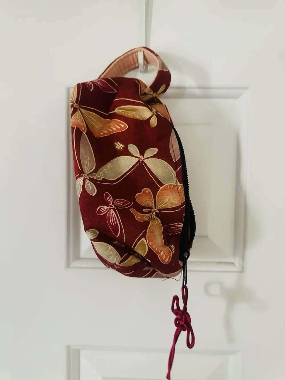 Small Cosmetic Travel Bag With Zipper. Red Floral Pattern